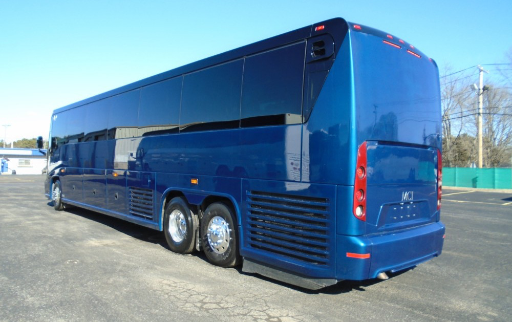 Blue 56 seater luxury coach bus on rent