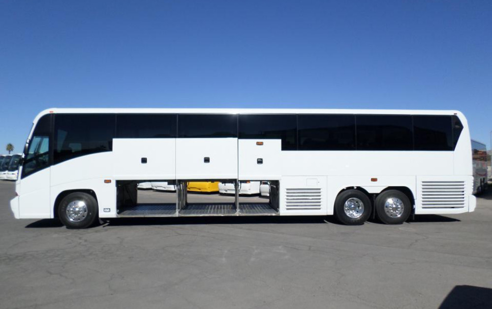 White 56 passenger seat luxury coach bus on rent